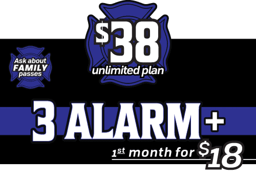 Female washer cleans wheel with high pressure gun